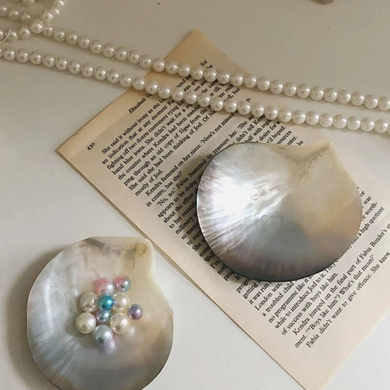 czarna podstawa na biżuterię w kształcie motyla