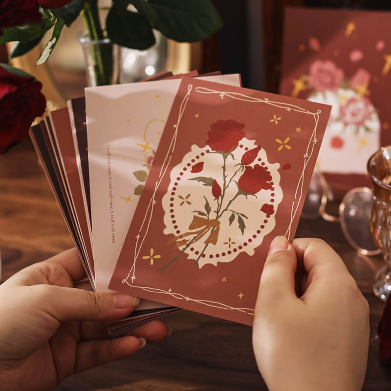 Kolorowa kolekcja pocztówek z czerwonymi różami Coquette