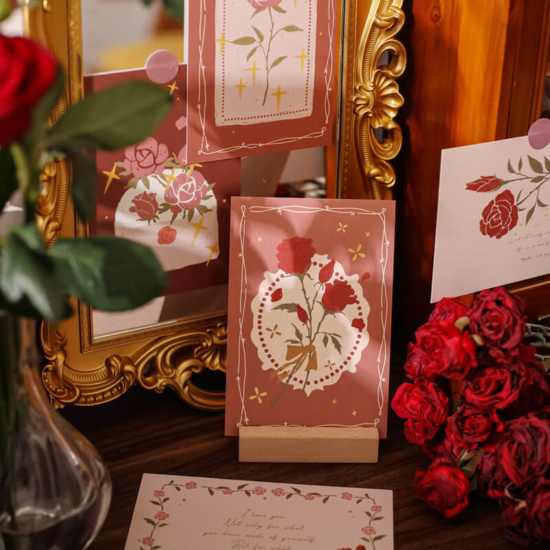 Kolorowa kolekcja pocztówek z czerwonymi różami Coquette