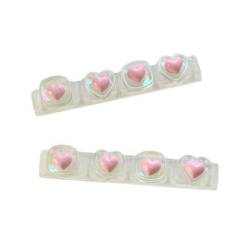 Uchwyt na kabel z różowymi serduszkami Coquette