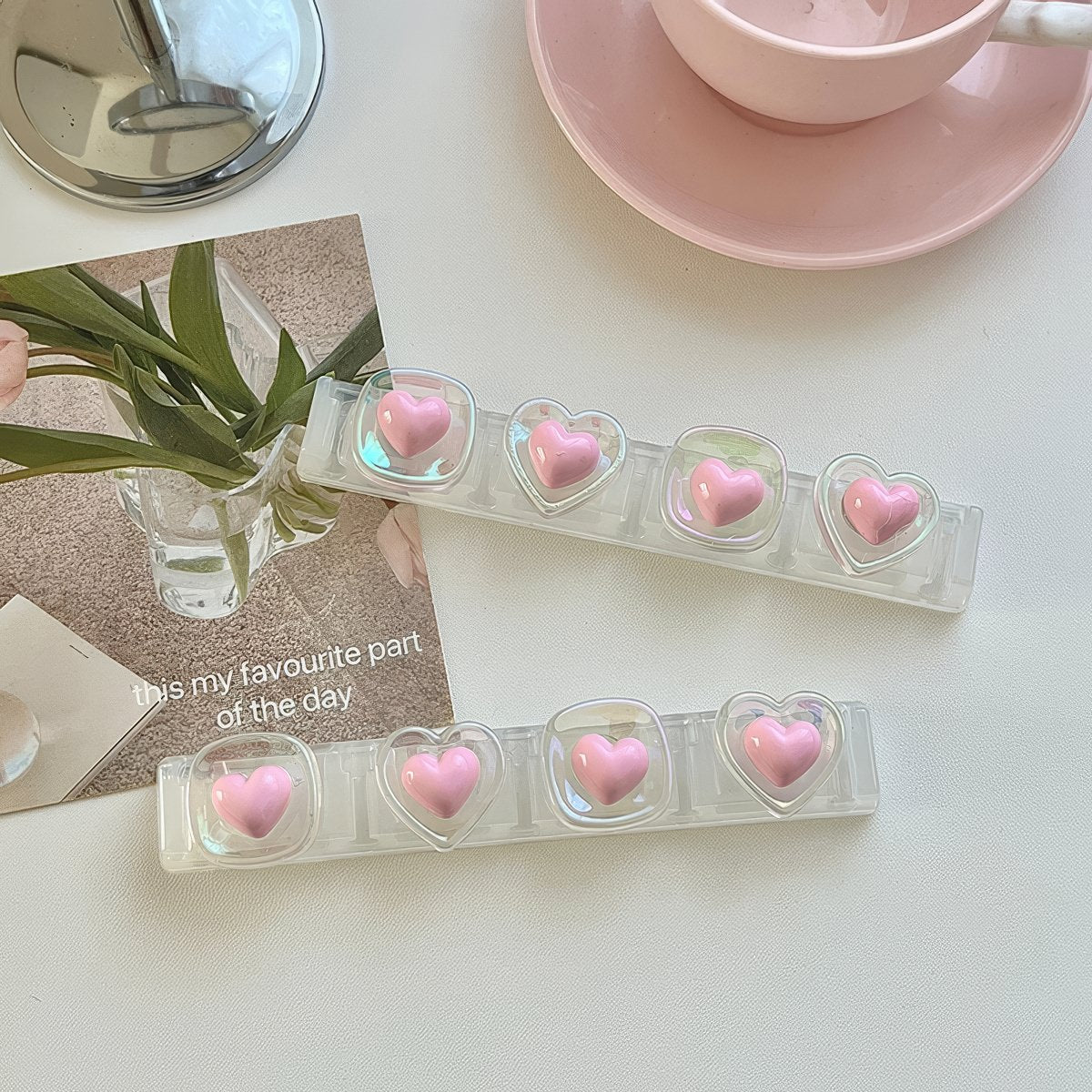 Uchwyt na kabel z różowymi serduszkami Coquette