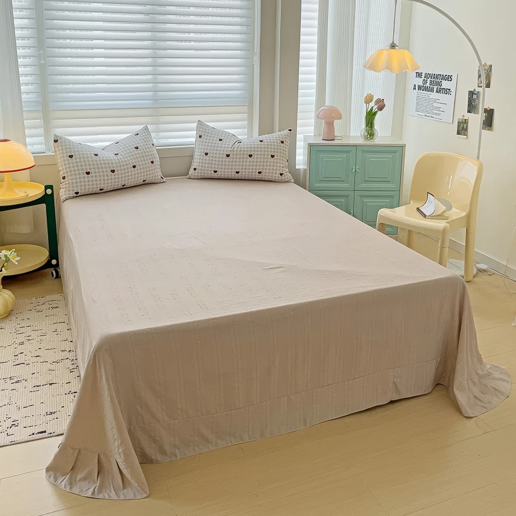 Pościel z wzorem w kratkę i czerwonymi sercami