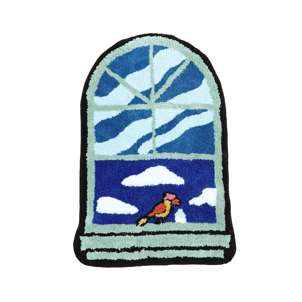 Sztuczny dywan z wszurkanym wzorem na oknie