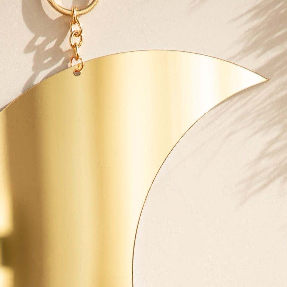 Lustro na ścianę z motywem księżyca