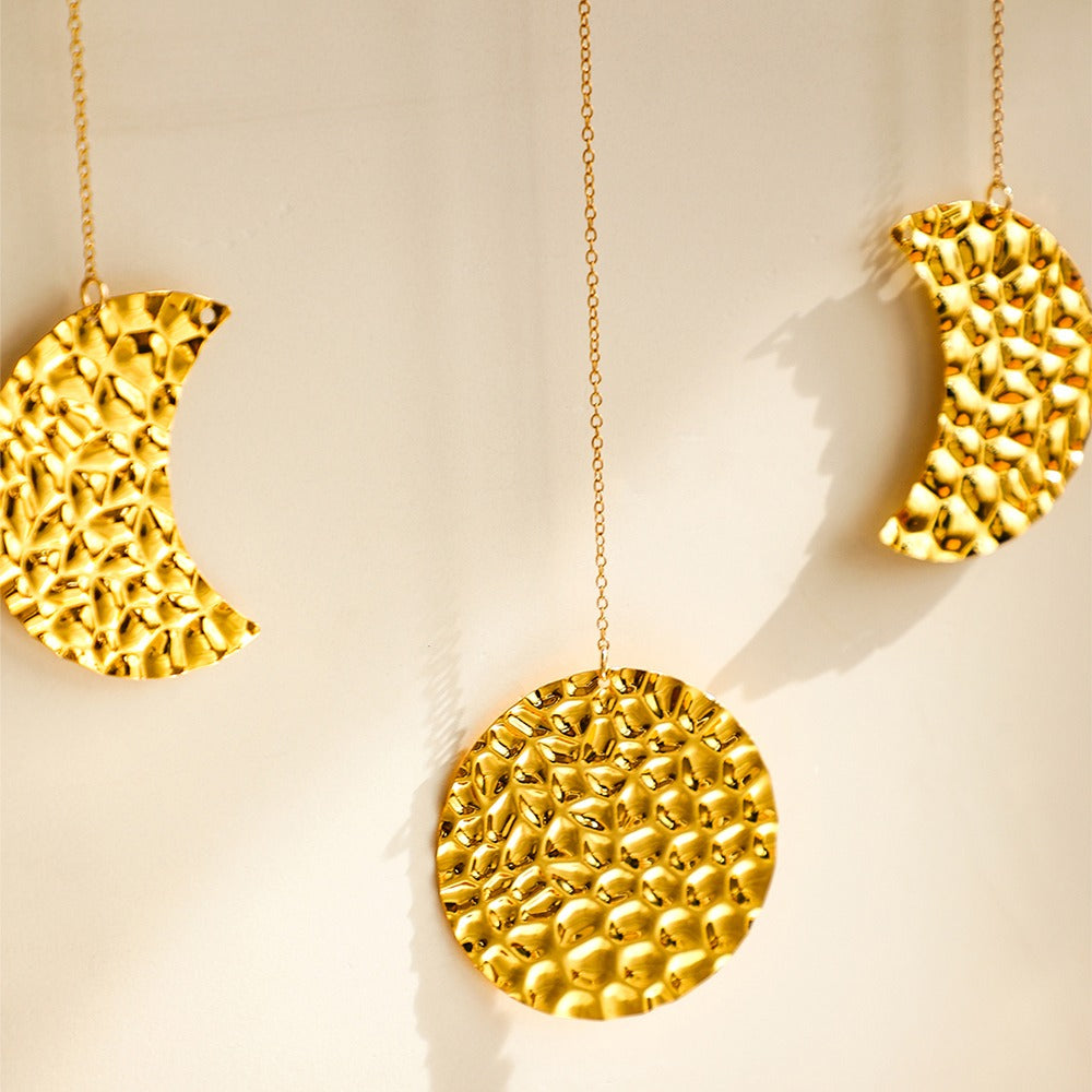 Zasłona ścienna z fazami księżyca z kutego złota