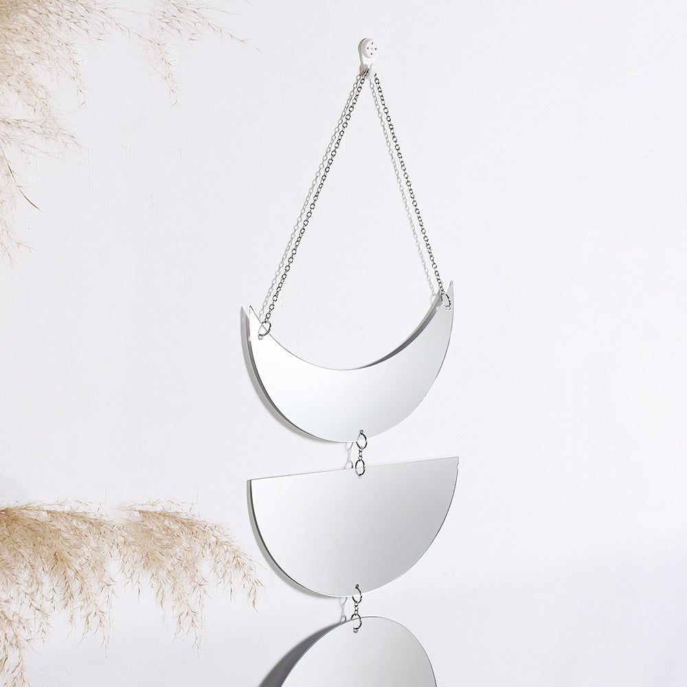 Lustro ścienne z motywem faz księżyca