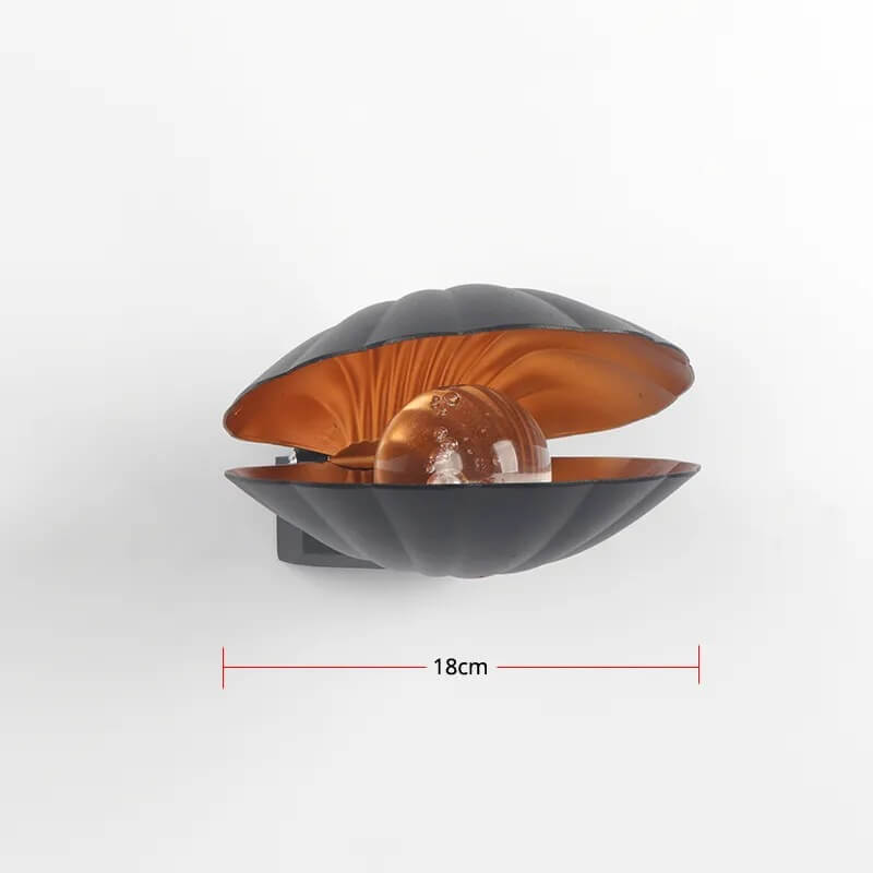 Lampa ścienna z muszlami