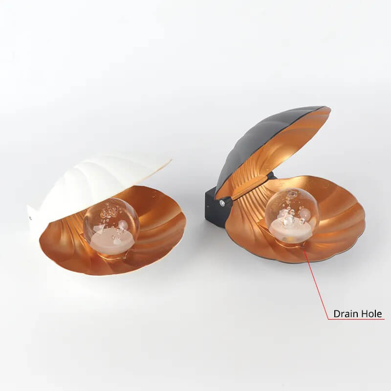 Lampa ścienna z muszlami