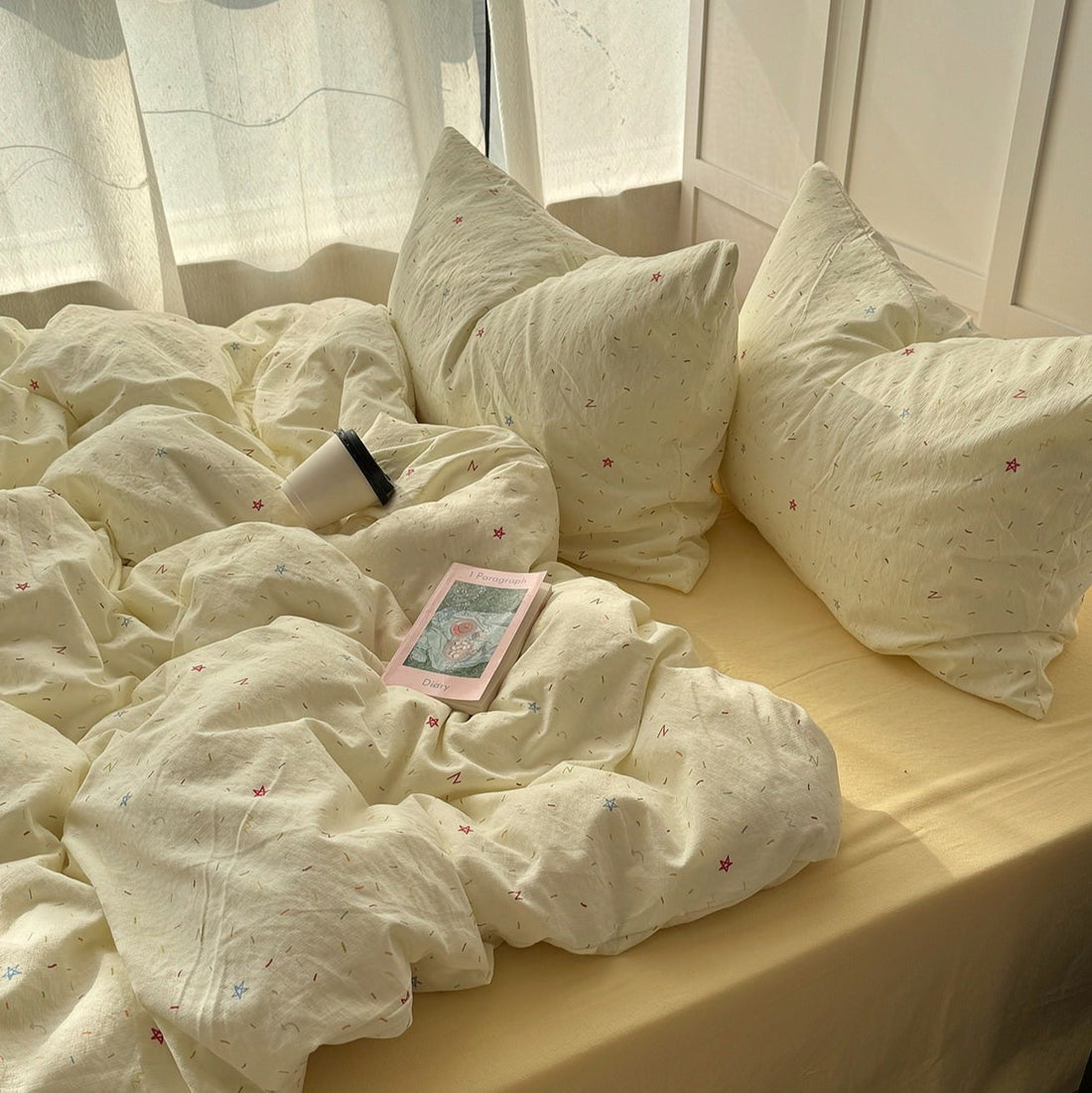 Kolorowy zestaw pościeli z pastelowymi wzorami i sprinkles